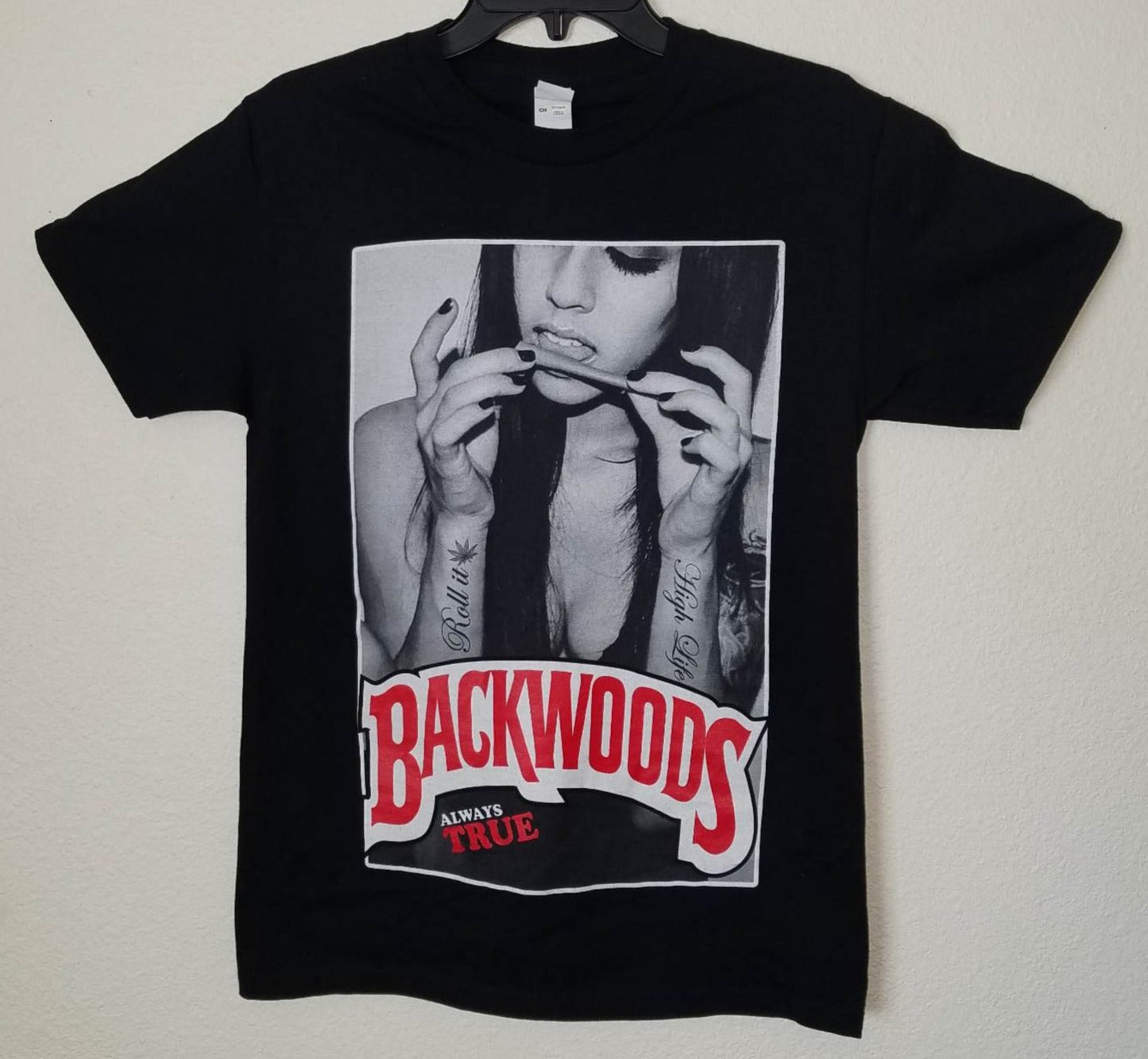 "Backwoods Always True Girl" Unisex Silkscreen Novelty 420 T-Shirt – High-quality cotton tee featuring a bold graphic design, available in sizes Small to 3XL. Perfect for Backwoods and 420 lifestyle fans.