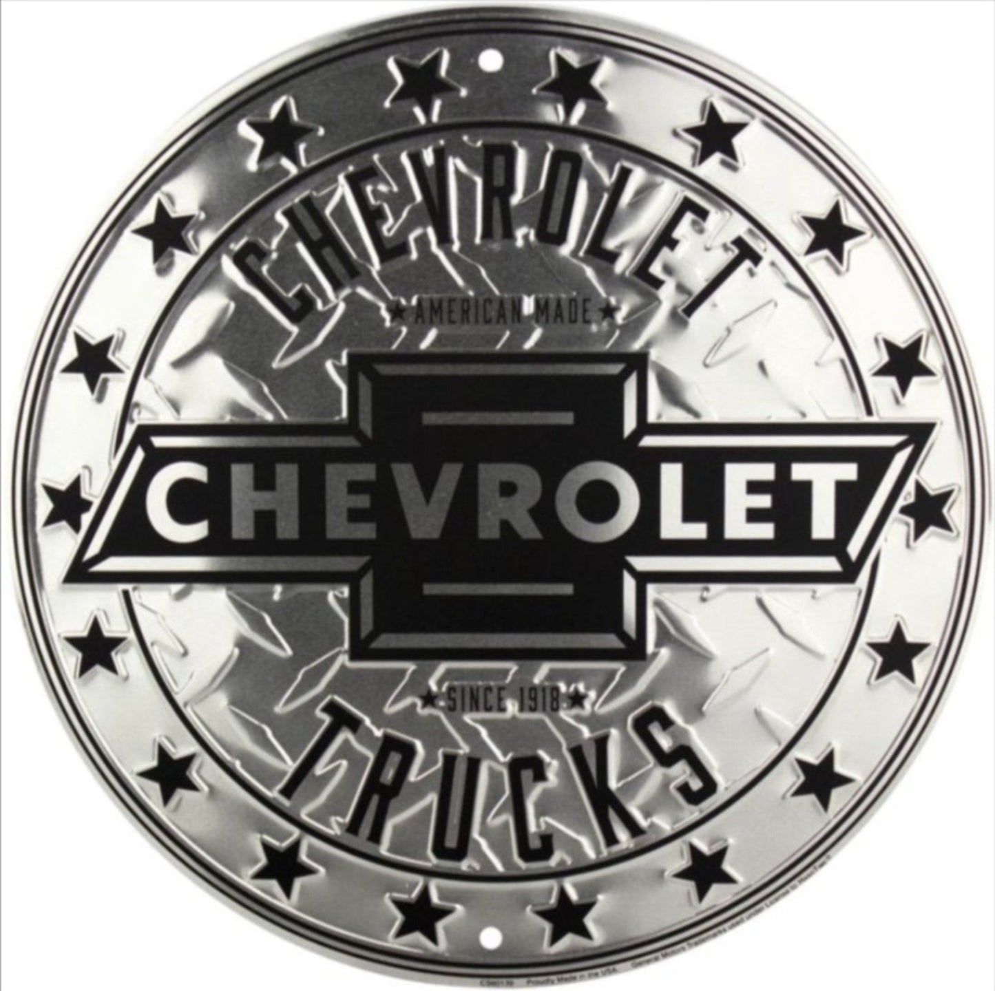 Chevrolet Trucks embossed round aluminum sign featuring a diamond plate background and star ring, available in 12 inch and 24 inch diameter.
