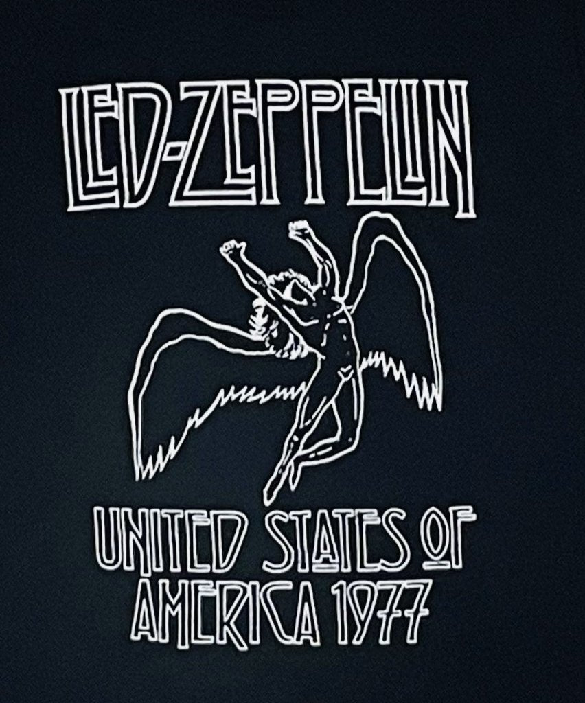 "Led Zeppelin USA 1977 Youth T-Shirt – Classic rock band shirt. Available in sizes XS-XL.