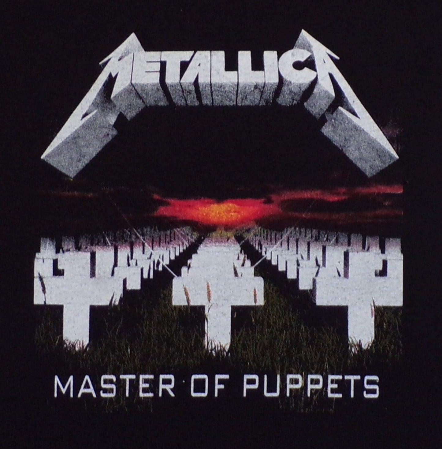 Metallica Master of Puppets' silkscreen t-shirt featuring the iconic album artwork. Available in sizes XS-XL.