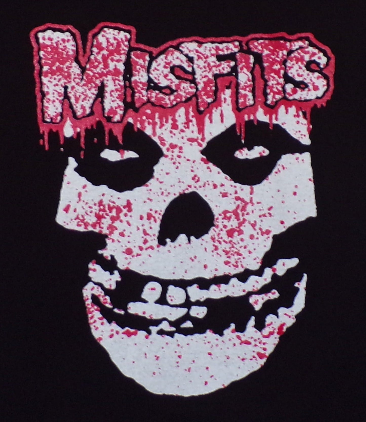 Misfits Bloody Fiend Face Youth Unisex Silkscreen T-Shirt featuring the iconic Fiend Skull with a bloody design on a black cotton tee. Available in sizes XS-XL.