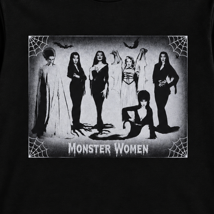 Close-up of the Monster Women of Horror – Fright Queens shirt showing the black-and-white character lineup with spiderwebs, bats and distressed details.