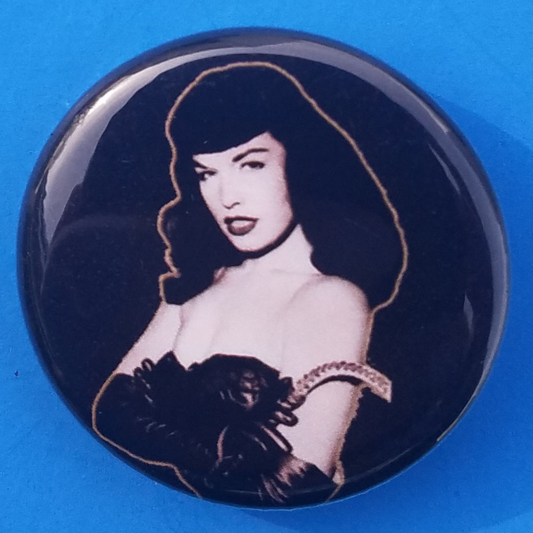 new bettie page button set of 3 fashion buttons are 1.25 inches in size Set Includes Bettie Page Color Picture Bettie Page Holding Whip Bettie Page Sitting With Leg Up
