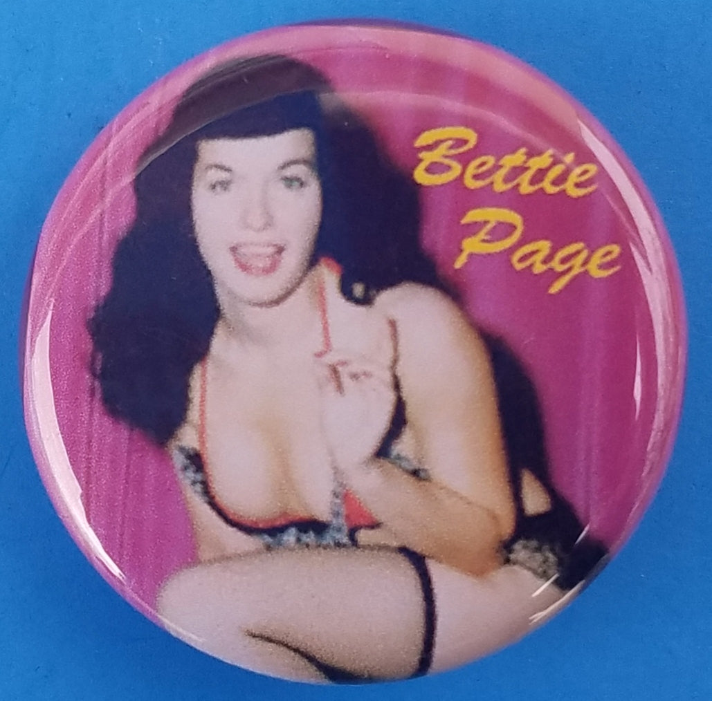new bettie page button set of 3 fashion buttons are 1.25 inches in size Set Includes Bettie Page Color Picture Bettie Page Holding Whip Bettie Page Sitting With Leg Up