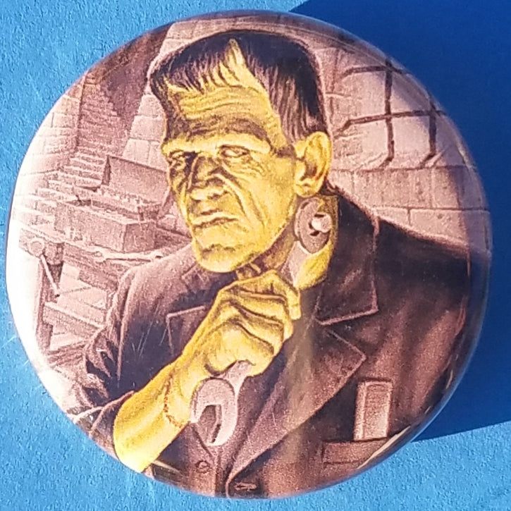new bride of frankenstein button set of 7 fashion buttons are 1.25 inches in size Set Includes Bride of Frankenstein Bout To Kiss Bride of Frankenstein Couple In Heart Bride of Frankenstein Couple Sharing A Drink Bride of Frankenstein Front View Bride of Frankenstein Hands Over Breast Bride of Frankenstein Side View Frankenstein With Wrench tv movie horror