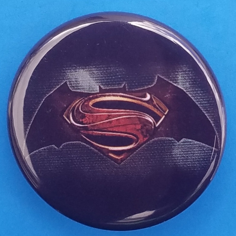 new dc characters button set of 4 fashion buttons are 1.25 inches in size Set Includes Batman 60s Cartoon Swinging Batman Superman Combined Logos Vintage Cartoon Joker Batwoman comics tv collection pinback