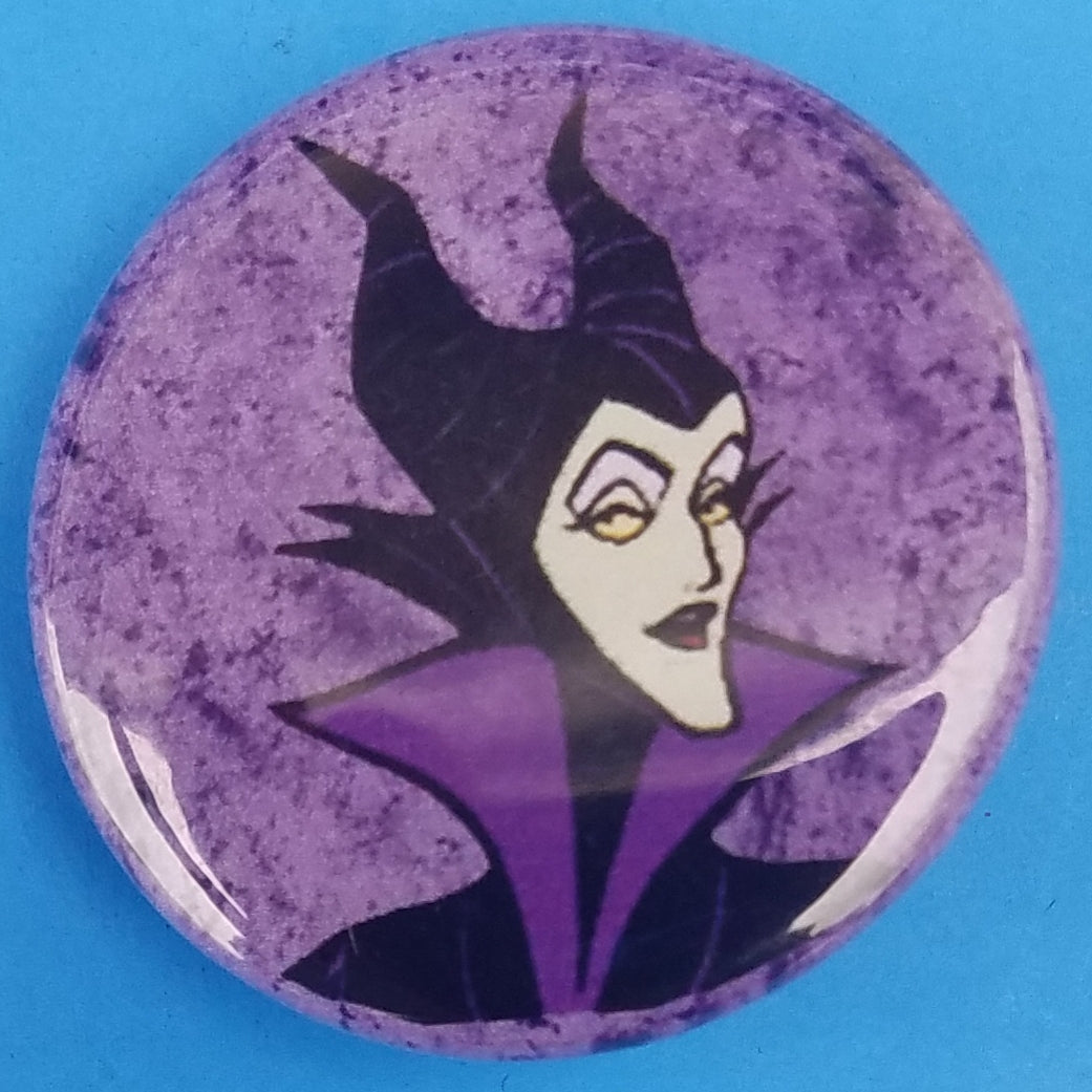new disney villains button set of 4 fashion buttons are 1.25 inches in size Set Includes Cruella De Ville Evil Queen Malificent Ursula witches cartoons movies animation snow white the little mermaid 100 dalmations sleeping beauty fantasy collection pinback
