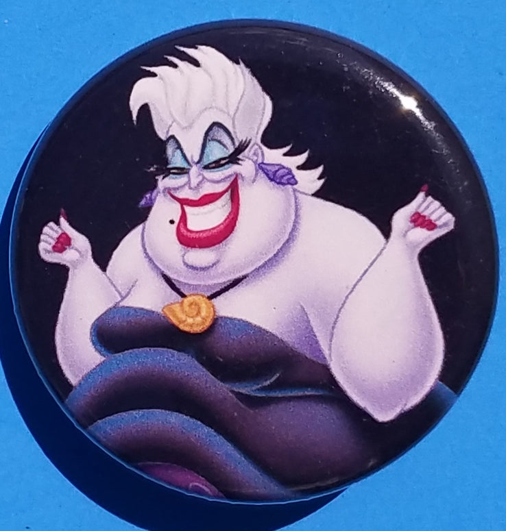 new disney villains button set of 4 fashion buttons are 1.25 inches in size Set Includes Cruella De Ville Evil Queen Malificent Ursula witches cartoons movies animation snow white the little mermaid 100 dalmations sleeping beauty fantasy collection pinback