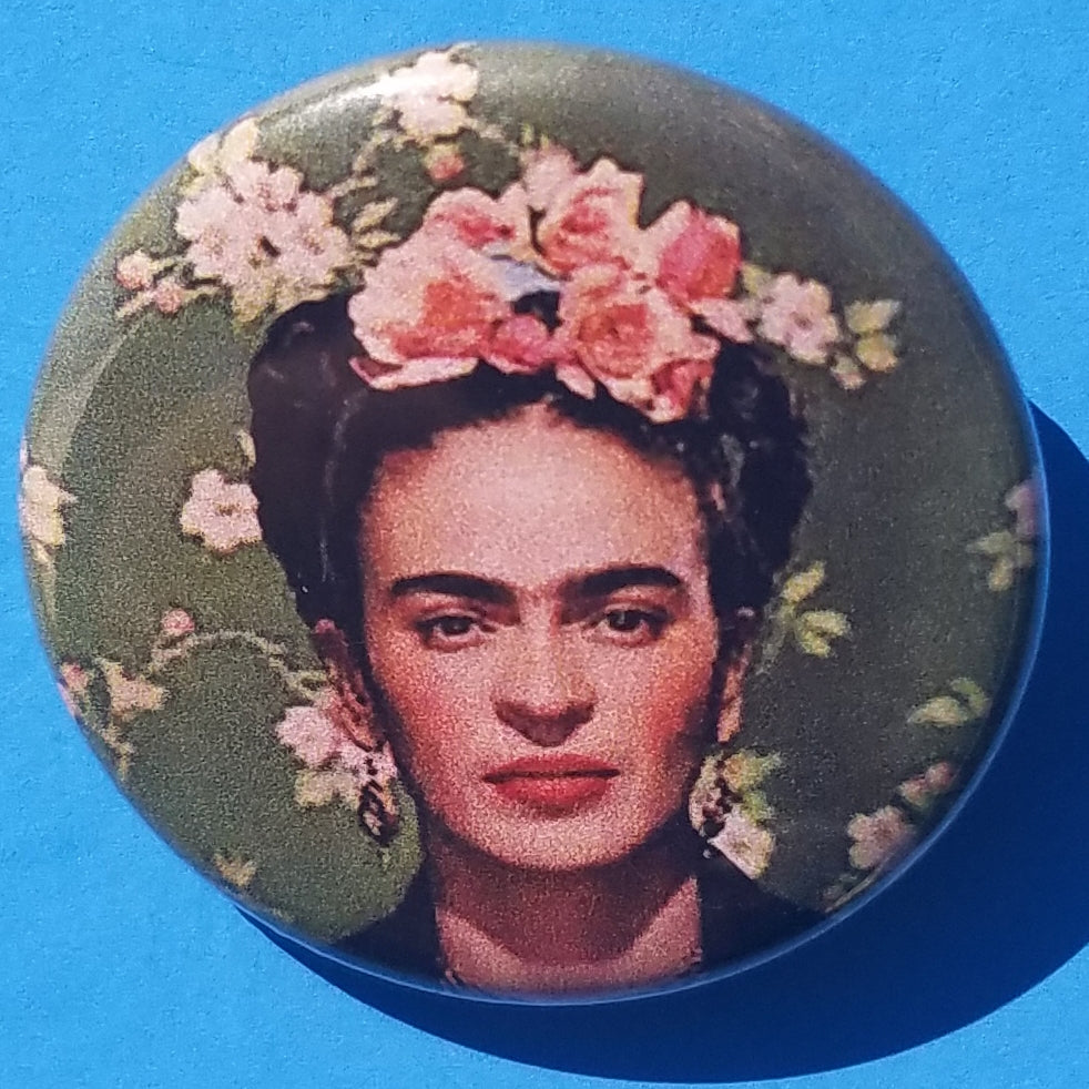 new frida kahlo button set of 4 fashion buttons are 1.25 inches in size Set Includes Frida As A Kid Frida on Green With Flowers Frida With White Background Frida Up Close With Flowers mexican style movies pinback