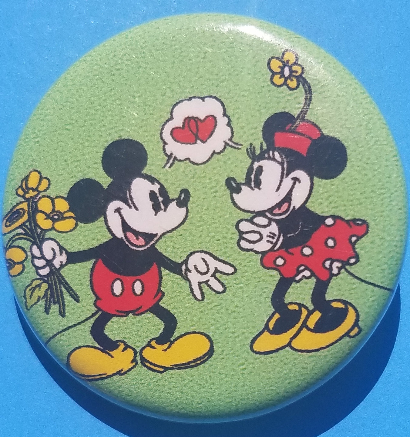 new mickey minnie button set of 6 fashion buttons are 1.25 inches in size Set Includes Mickey Minnie Hearts Flowers Mickey Minnie Hugging Mickey Minnie Kissing Mickey Mouse Looking Over Mickeys Backside Minnie Mouse movie cartoon collection disney pinback