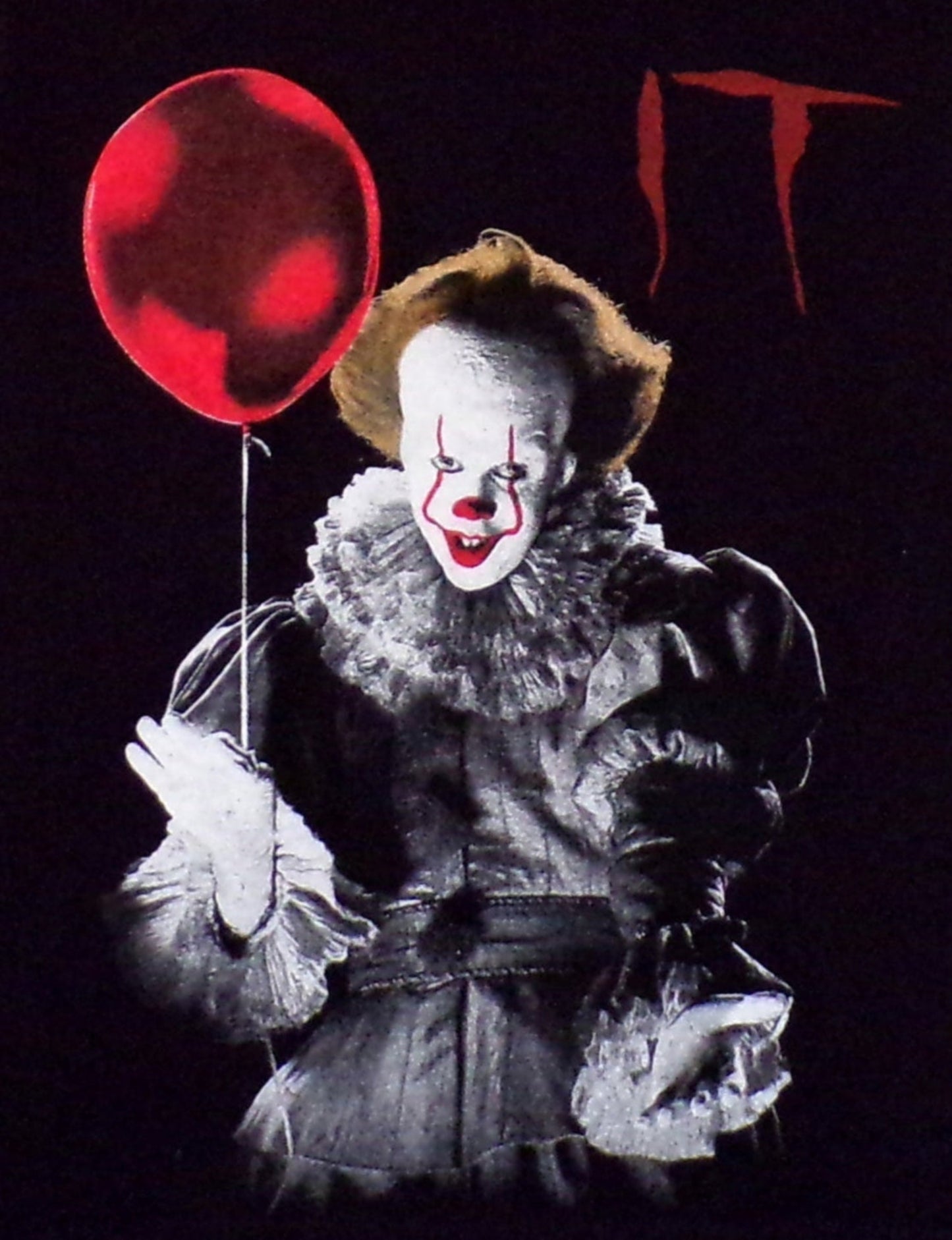 Horror Pennywise IT Clown with Red Balloon Youth Silkscreen T-Shirt featuring a detailed design of Pennywise holding a red balloon from the classic horror movie IT. Available in sizes XS-XL youth from JB Accessories05