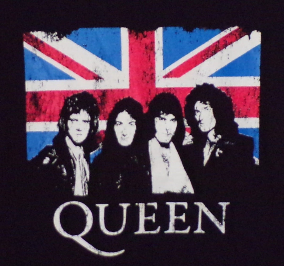 Front view of Queen Union Jack graphic T-shirt featuring band portrait over British flag on black tee