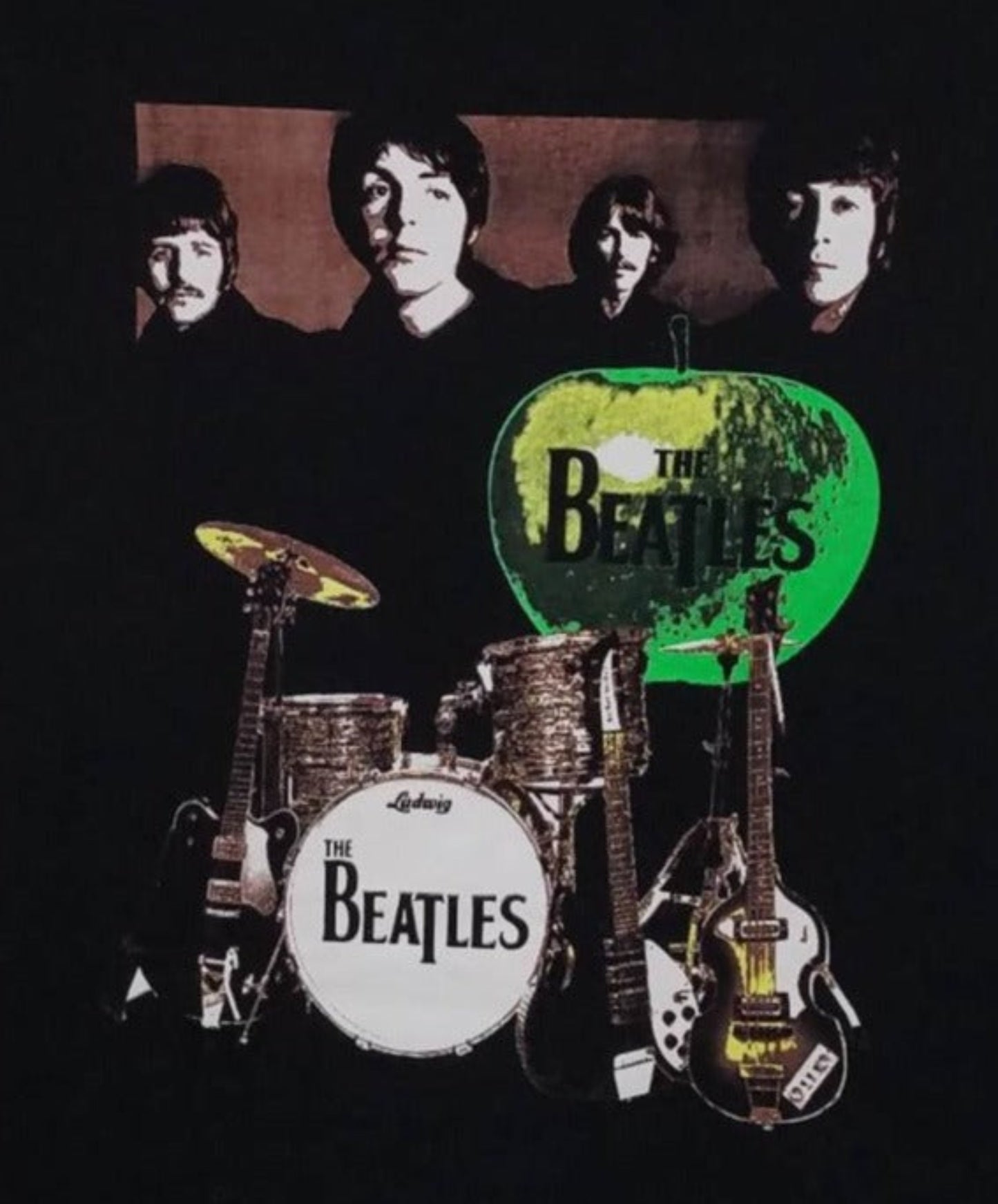 Front view of The Beatles green apple graphic T-shirt featuring band portrait and instruments printed in silkscreen on black cotton tee
