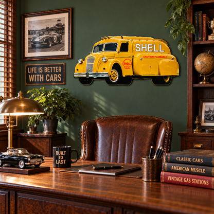 1938 Dodge Airflow Shell fuel tanker sign displayed in a wood garage and workshop with vintage automotive and petroleum décor.