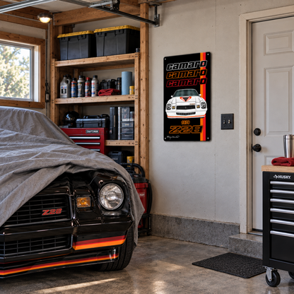 1979 Chevrolet Camaro Z28 metal sign displayed in a garage workshop above a black Camaro with tool storage and automotive décor.