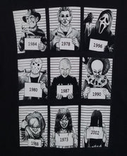 Load image into Gallery viewer, &quot;9 Most Wanted Mugshots&quot; Horror Unisex T-Shirt featuring black and white mugshots of iconic horror characters: Freddy Krueger, Michael Myers, Ghostface, Jason Voorhees, Pinhead, Pennywise, Chucky, Regan from The Exorcist, and Samara from The Ring. Each character is labeled with their debut year.








