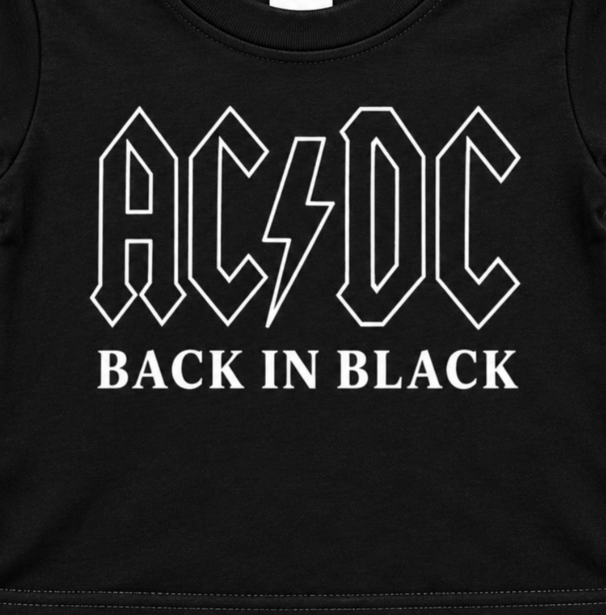 Close-up of the AC/DC Back in Black white outlined logo design on the black infant graphic T-shirt.