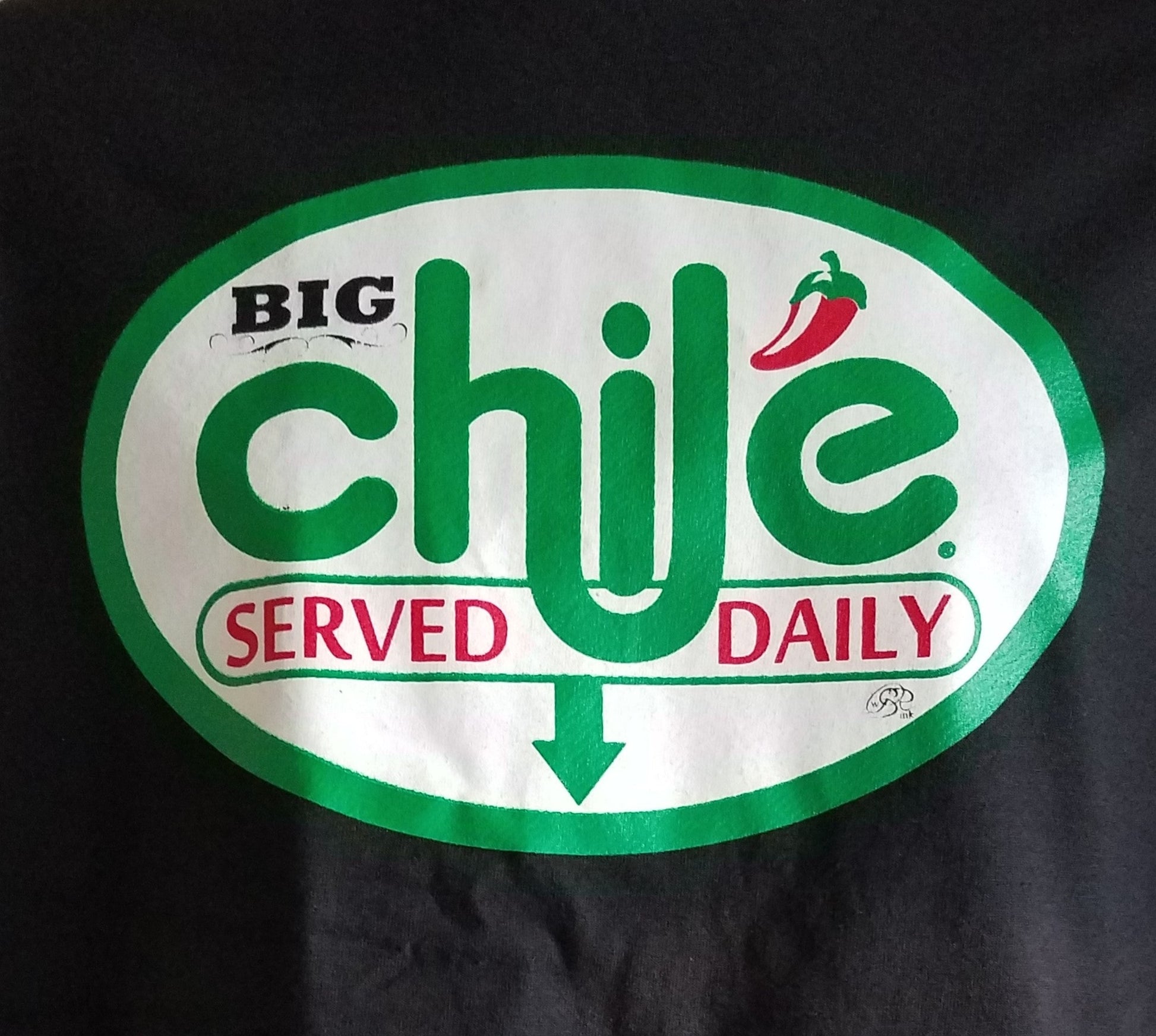 Big Chile Served Daily graphic T-shirt with parody logo and green arrow design unisex sizes S–2XL