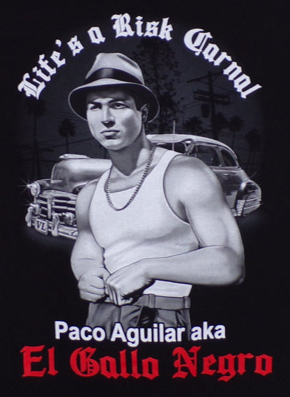“Blood In Blood Out – Life’s A Risk Carnal” T-shirt featuring Paco Aguilar (El Gallo Negro) in grayscale silkscreen print.