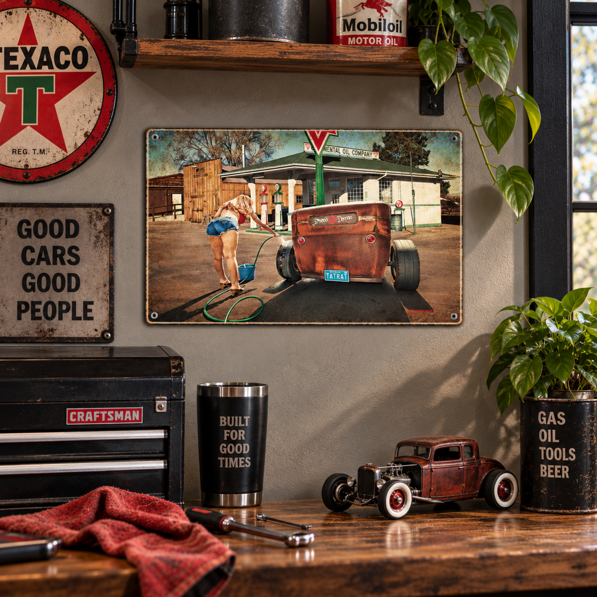 Bob Kramer Rat Rod Car Wash metal sign displayed above a garage workbench with automotive signs, tools, and vintage garage décor.