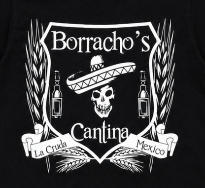Borracho’s Cantina skull and sombrero graphic T-shirt with vintage bar crest design on black shirt unisex sizes S–3XL