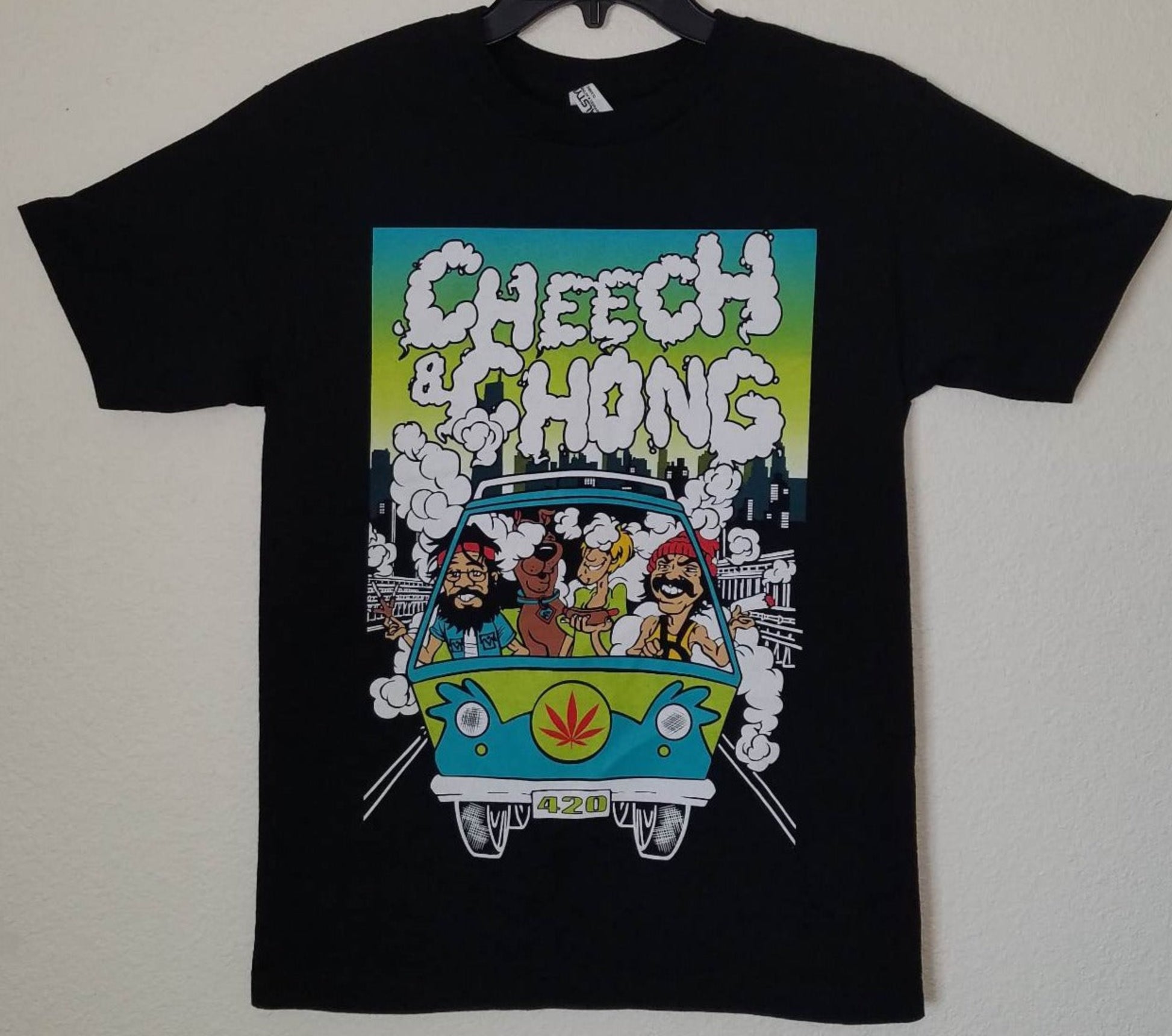 Cheech & Chong - Scooby Doo & Shaggy Mystery Machine Unisex T-shirt featuring the iconic stoner duo with a playful design inspired by the classic Scooby-Doo characters and the Mystery Machine.