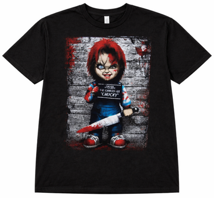 Front view of Chucky Mugshot T-shirt featuring horror doll graphic with bloody knife and mugshot background printed in authentic silkscreen on black cotton tee.