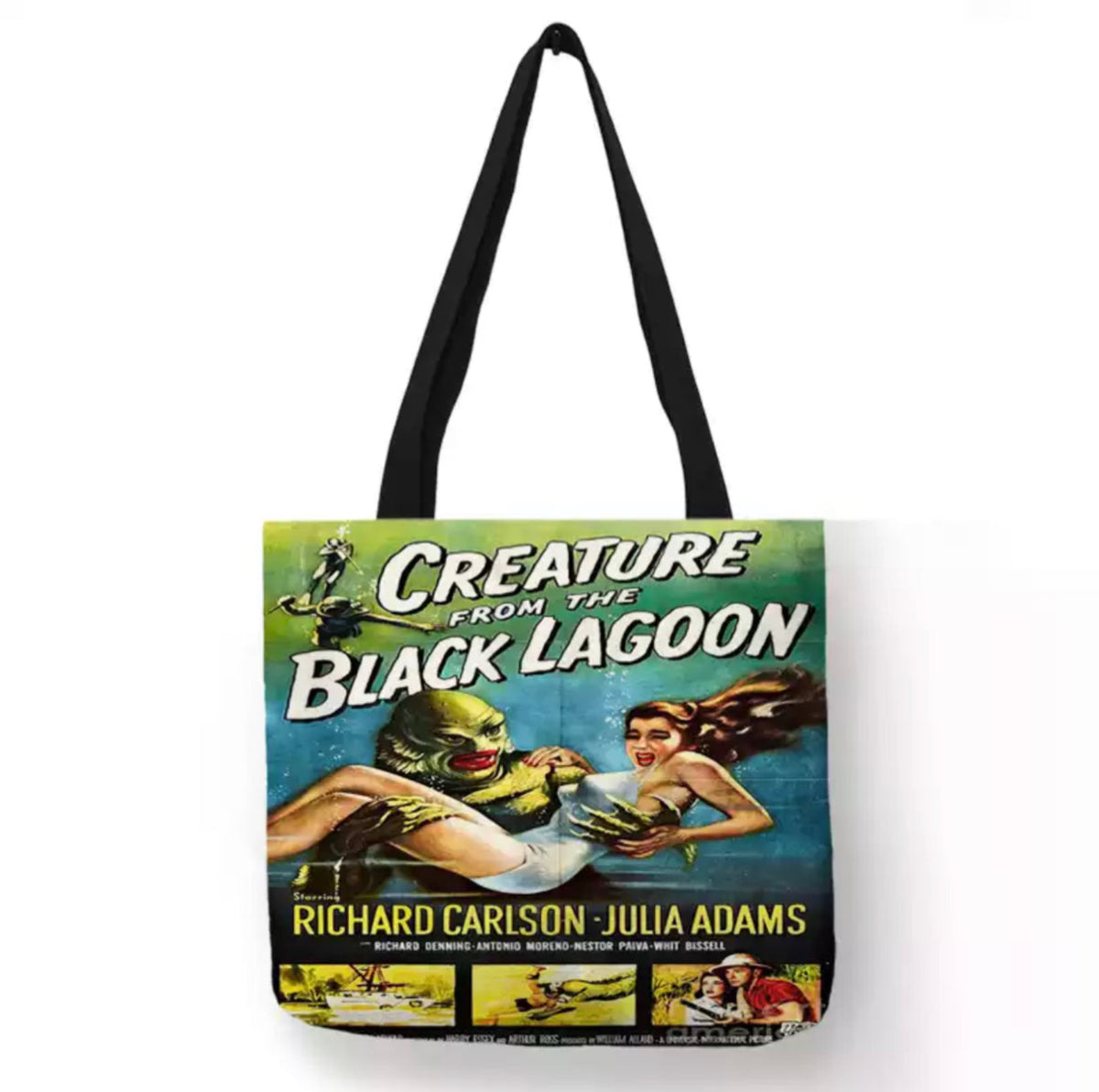 Black double-sided Creature from the Black Lagoon canvas tote bag featuring the green Gill-man carrying Julie Adams through the water in a colorful 1954 classic horror design.