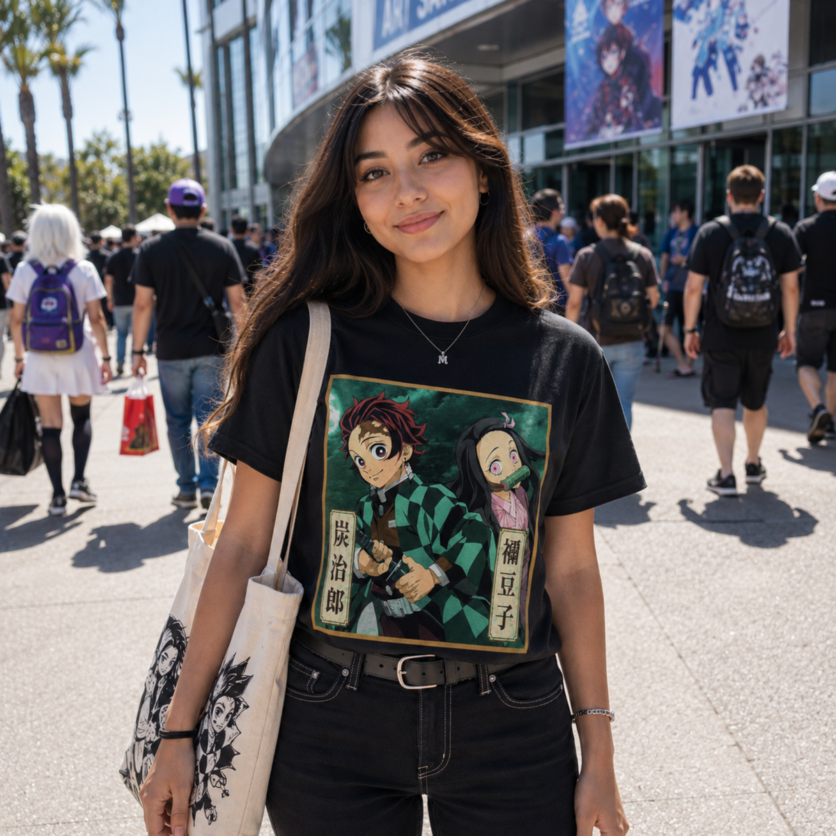 Demon Slayer Tanjiro and Nezuko Kamado black graphic T-shirt worn outside an anime convention, featuring the colorful brother-and-sister artwork for Demon Slayer fans.