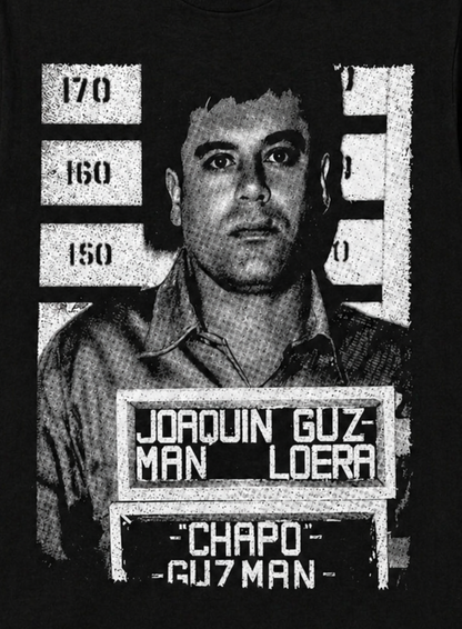 Black adult unisex El Chapo 1993 mugshot graphic T-shirt featuring Joaquín “El Chapo” Guzmán’s historic booking photograph with identification placard and height chart, available in sizes Small through 2X-Large.