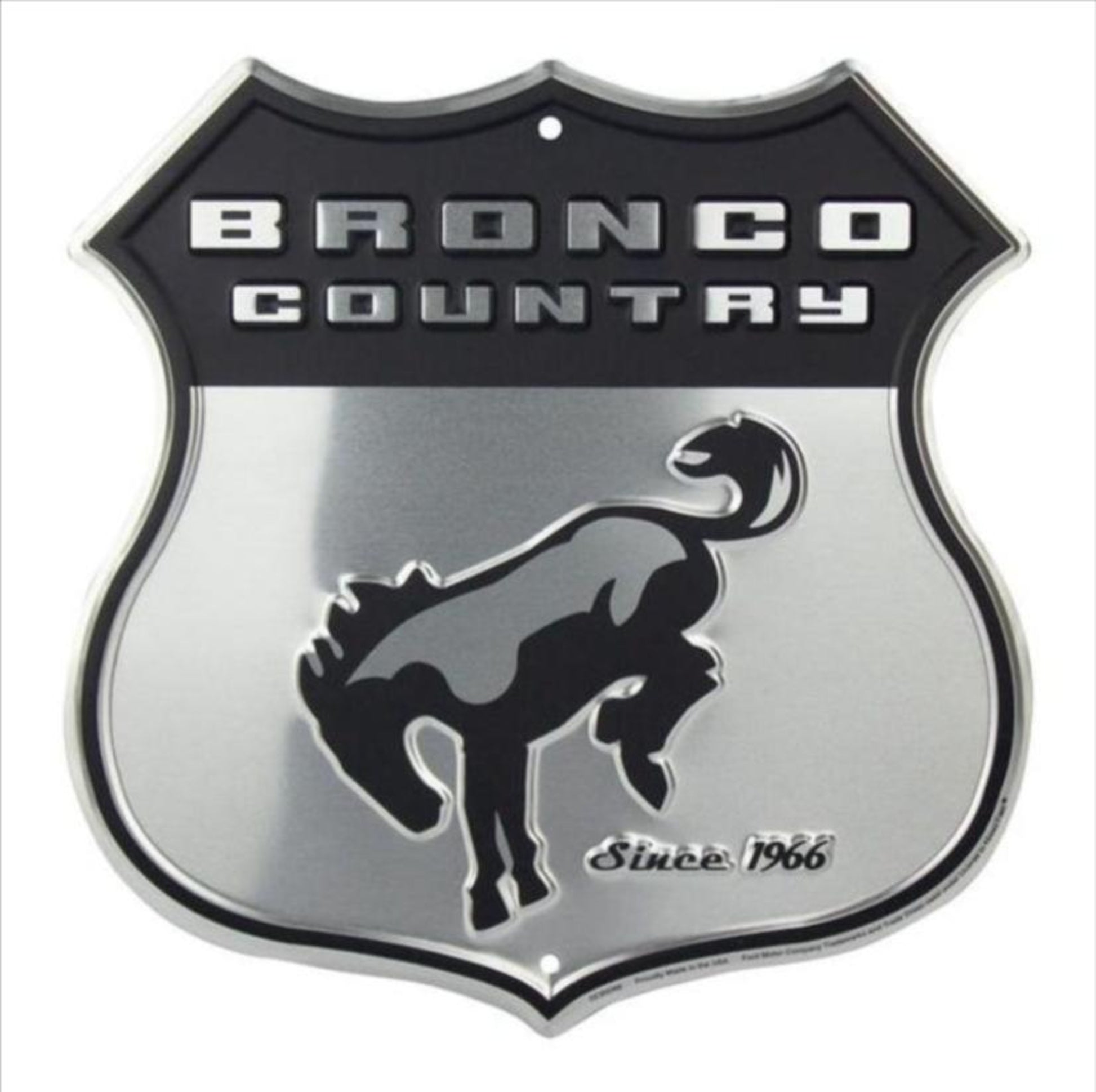 Ford Bronco embossed aluminum shield sign featuring Bronco Country design and bucking Bronco graphic, 12 inch diameter.