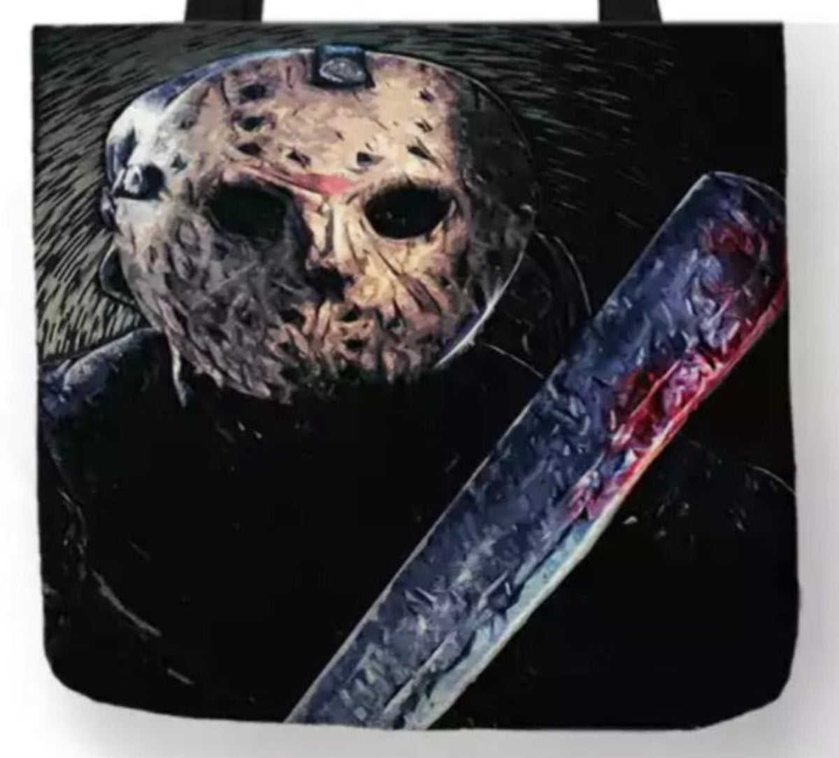 Close-up of the Friday the 13th Jason Machete Mask canvas tote design showing Jason's weathered hockey mask, dark eyeholes, red markings, and a blood-covered machete.