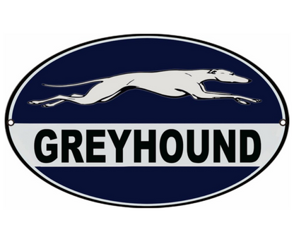 Classic Greyhound Bus Station oval metal sign featuring the running Greyhound logo on a blue and white oval design.