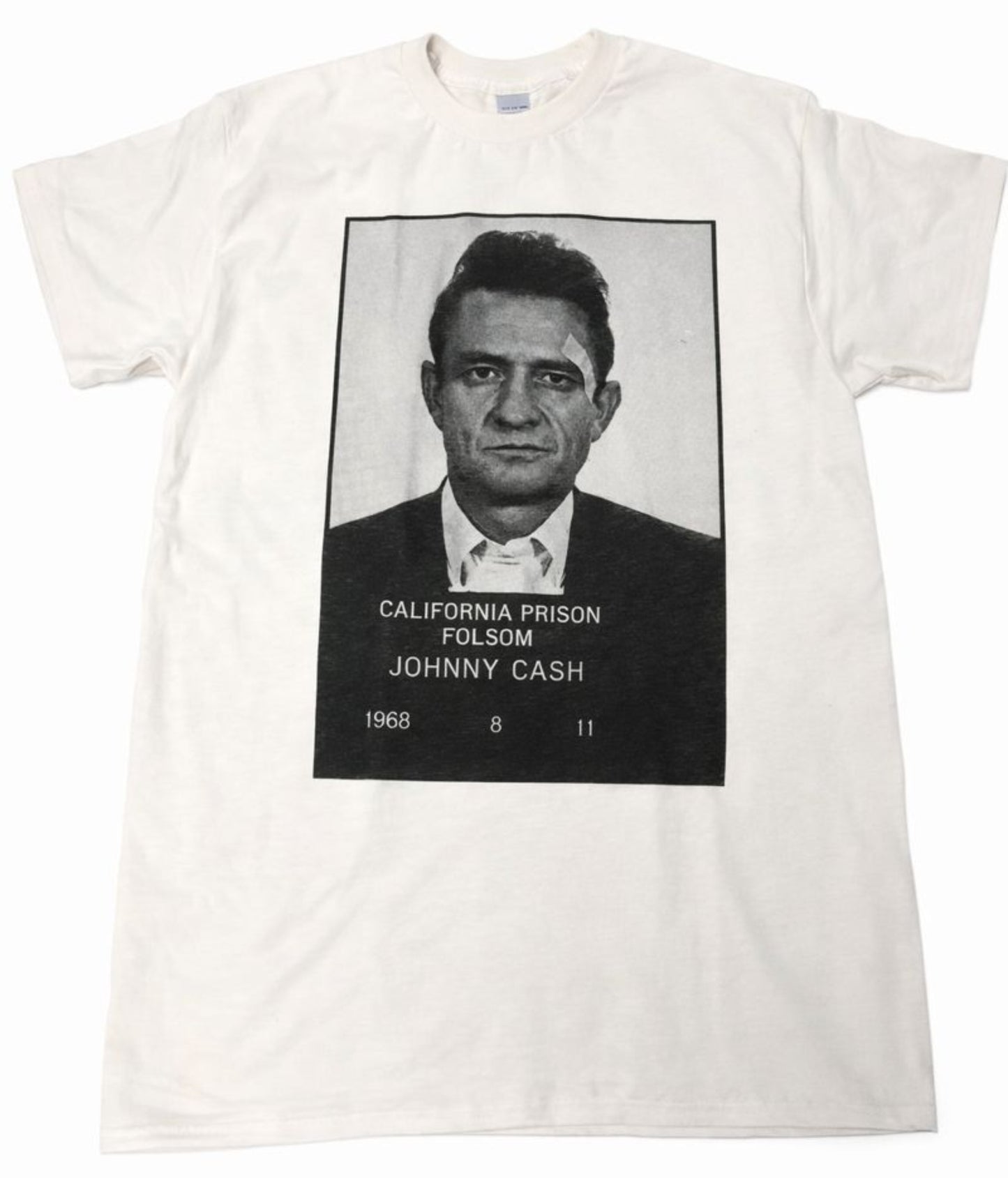 Unisex “Johnny Cash – Folsom Prison 1968” T-shirt featuring the classic black-and-white mugshot print, vintage music apparel in sizes Small–2XL.
