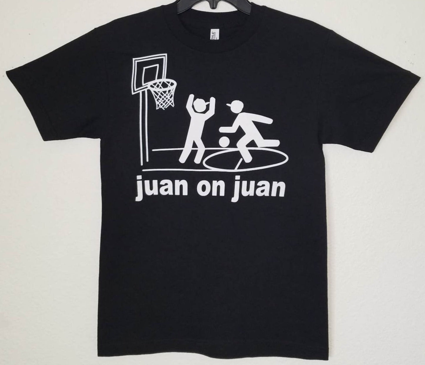 Juan on Juan basketball funny T-shirt featuring two players one-on-one graphic unisex apparel sizes S–2XL