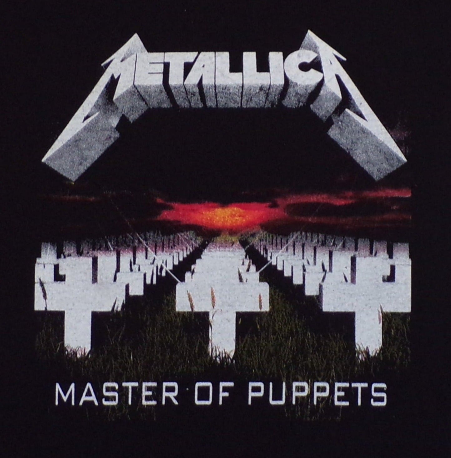 Metallica Master of Puppets youth unisex graphic T-shirt featuring iconic album artwork printed in silkscreen on black cotton tee
