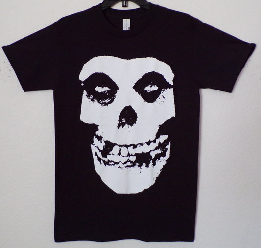 Front view of Misfits Fiend Skull logo graphic T-shirt featuring iconic white skull design on black tee