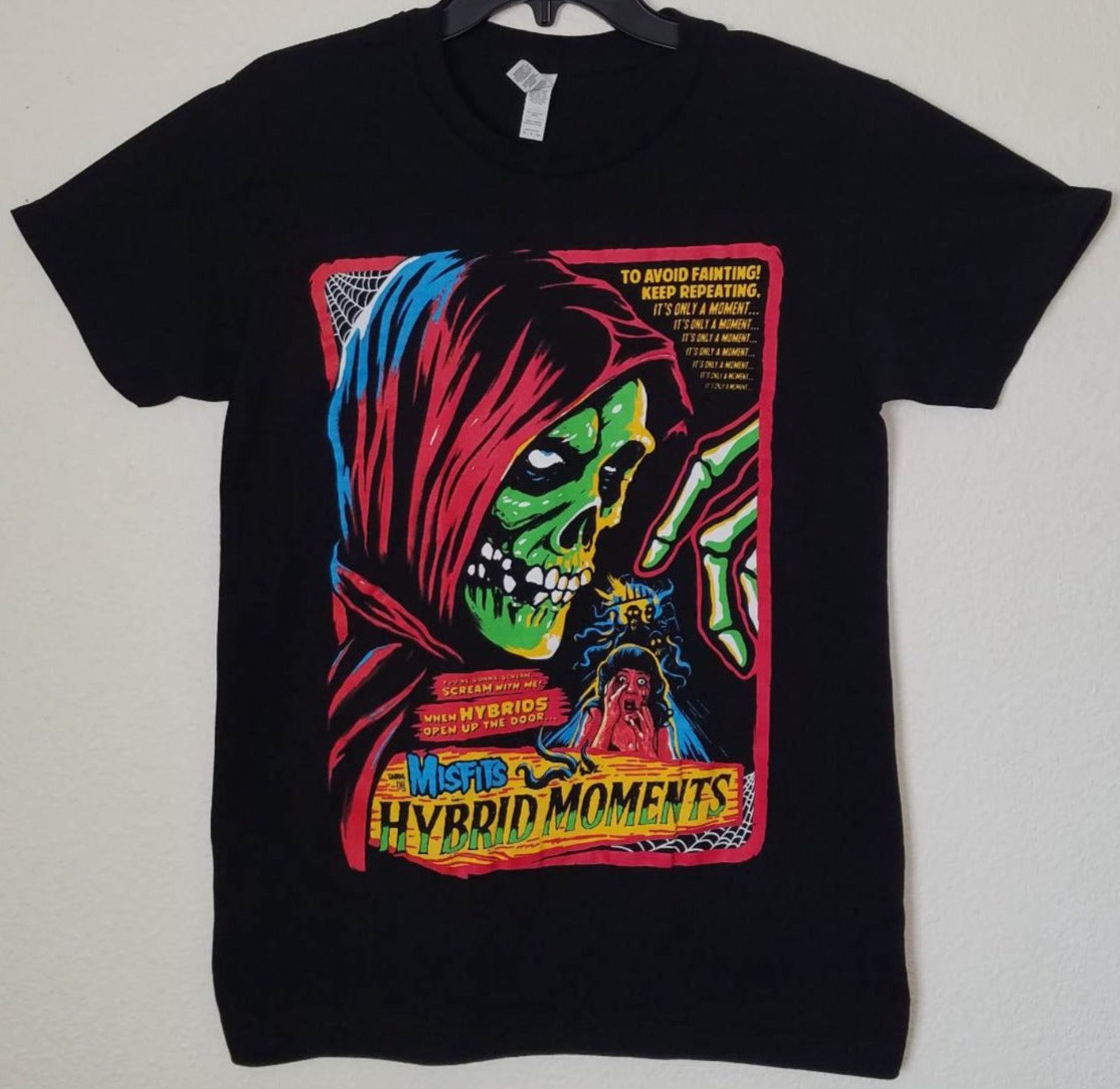 Black Misfits t-shirt featuring colorful horror-style “Hybrid Moments” artwork – Unisex Silkscreen