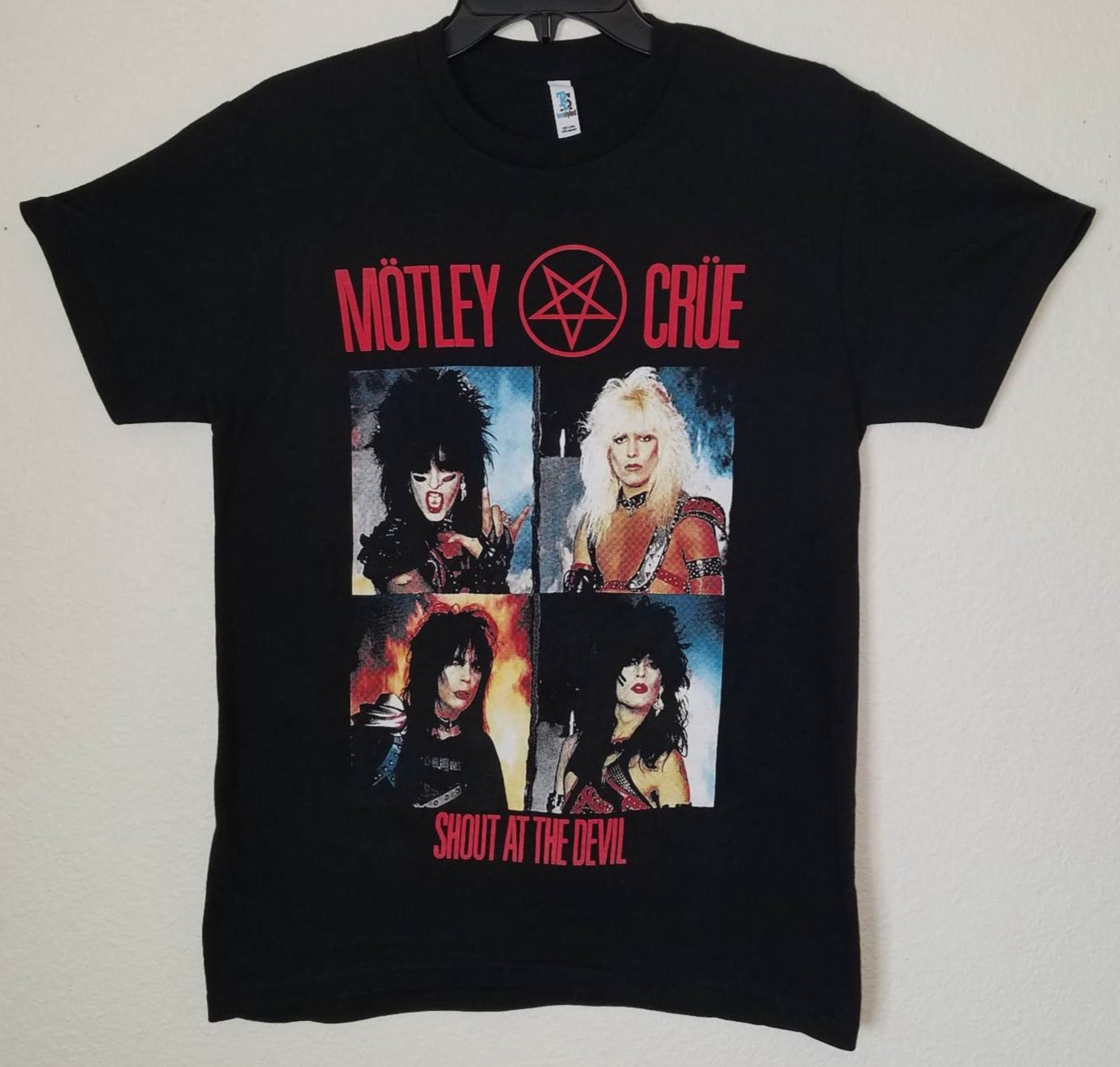 Mötley Crüe Shout At The Devil Unisex T-Shirt featuring bold album artwork on a black background. Available in sizes Small to 2XL.







