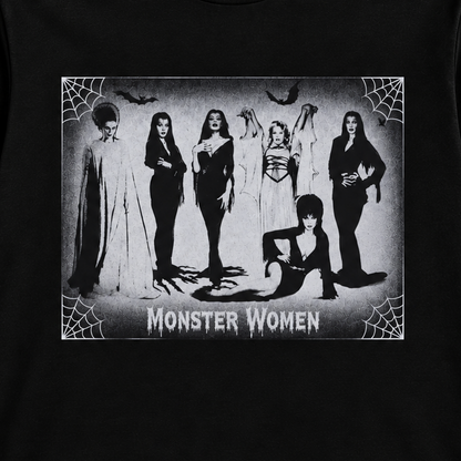 Close-up of the Monster Women of Horror – Fright Queens shirt showing the black-and-white character lineup with spiderwebs, bats and distressed details.