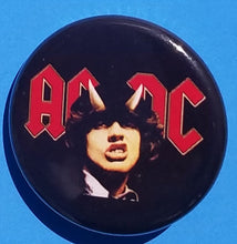 Load image into Gallery viewer, New AC/DC Button Set Of 7 Fashion Buttons Are 1.25&quot; Inches In Size. Set Includes- 1. AC/DC Back In Black 2. AC/DC Brown Cannon 3. AC/DC Hells Bells 4. AC/DC Red Letter Logo On Black 5. AC/DC Red Letters With Face 6. AC/DC Stiff Upper Lip 7. AC/DC Who Made Who
