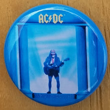 Load image into Gallery viewer, New AC/DC Button Set Of 7 Fashion Buttons Are 1.25&quot; Inches In Size. Set Includes- 1. AC/DC Back In Black 2. AC/DC Brown Cannon 3. AC/DC Hells Bells 4. AC/DC Red Letter Logo On Black 5. AC/DC Red Letters With Face 6. AC/DC Stiff Upper Lip 7. AC/DC Who Made Who
