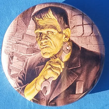 Load image into Gallery viewer, new bride of frankenstein button set of 7 fashion buttons are 1.25 inches in size Set Includes Bride of Frankenstein Bout To Kiss Bride of Frankenstein Couple In Heart Bride of Frankenstein Couple Sharing A Drink Bride of Frankenstein Front View Bride of Frankenstein Hands Over Breast Bride of Frankenstein Side View Frankenstein With Wrench tv movie horror
