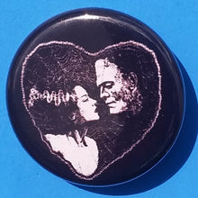 Load image into Gallery viewer, new bride of frankenstein button set of 7 fashion buttons are 1.25 inches in size Set Includes Bride of Frankenstein Bout To Kiss Bride of Frankenstein Couple In Heart Bride of Frankenstein Couple Sharing A Drink Bride of Frankenstein Front View Bride of Frankenstein Hands Over Breast Bride of Frankenstein Side View Frankenstein With Wrench tv movie horror
