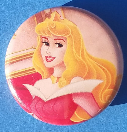 new disney princesses button set of 9 buttons are 1.25 inches in size Included In Set Snow White Ariel Elsa Cinderella Jasmin Belle Aurora Pocahontas Tiana collection cartoons movies animation