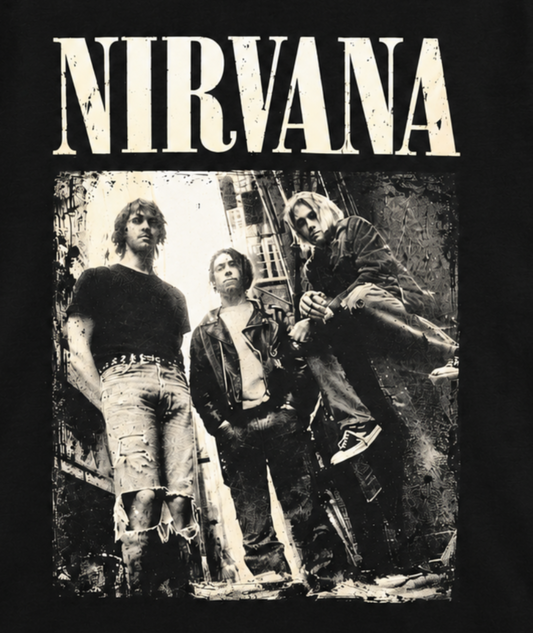Close-up of the Nirvana Alleyway Band Photo shirt design showing Kurt, Krist, and Dave with distressed photo details and oversized NIRVANA lettering.