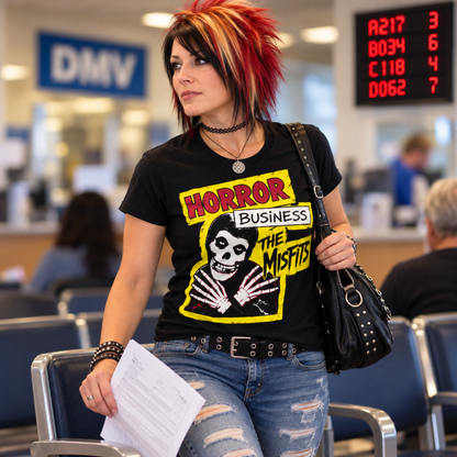Woman wearing a black Papa Roach Infest Cockroach graphic T-shirt while standing inside a DMV, featuring the distressed white cockroach design and Papa Roach name.