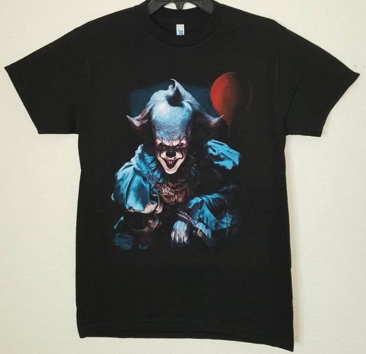 Pennywise IT Clown Unisex Silkscreen T-Shirt featuring a bold graphic of Pennywise from the horror movie IT. Available in sizes Small-2XL.