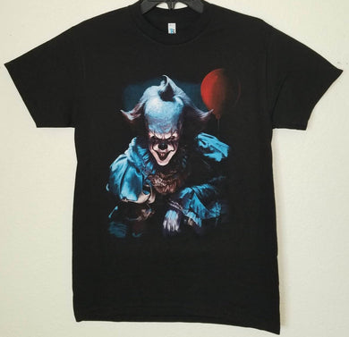 Pennywise IT Clown Unisex Silkscreen T-Shirt featuring a bold graphic of Pennywise from the horror movie IT. Available in sizes Small-2XL.