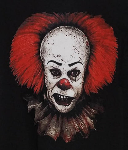 Pennywise IT Tim Curry horror graphic T-shirt featuring a close-up menacing grin design on black unisex cotton shirt S–3XL